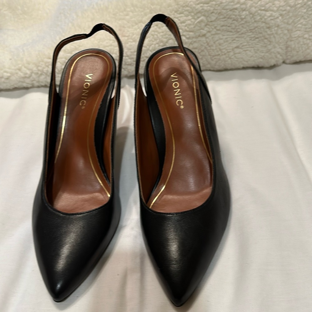 Vionic, black leather slingback heels.